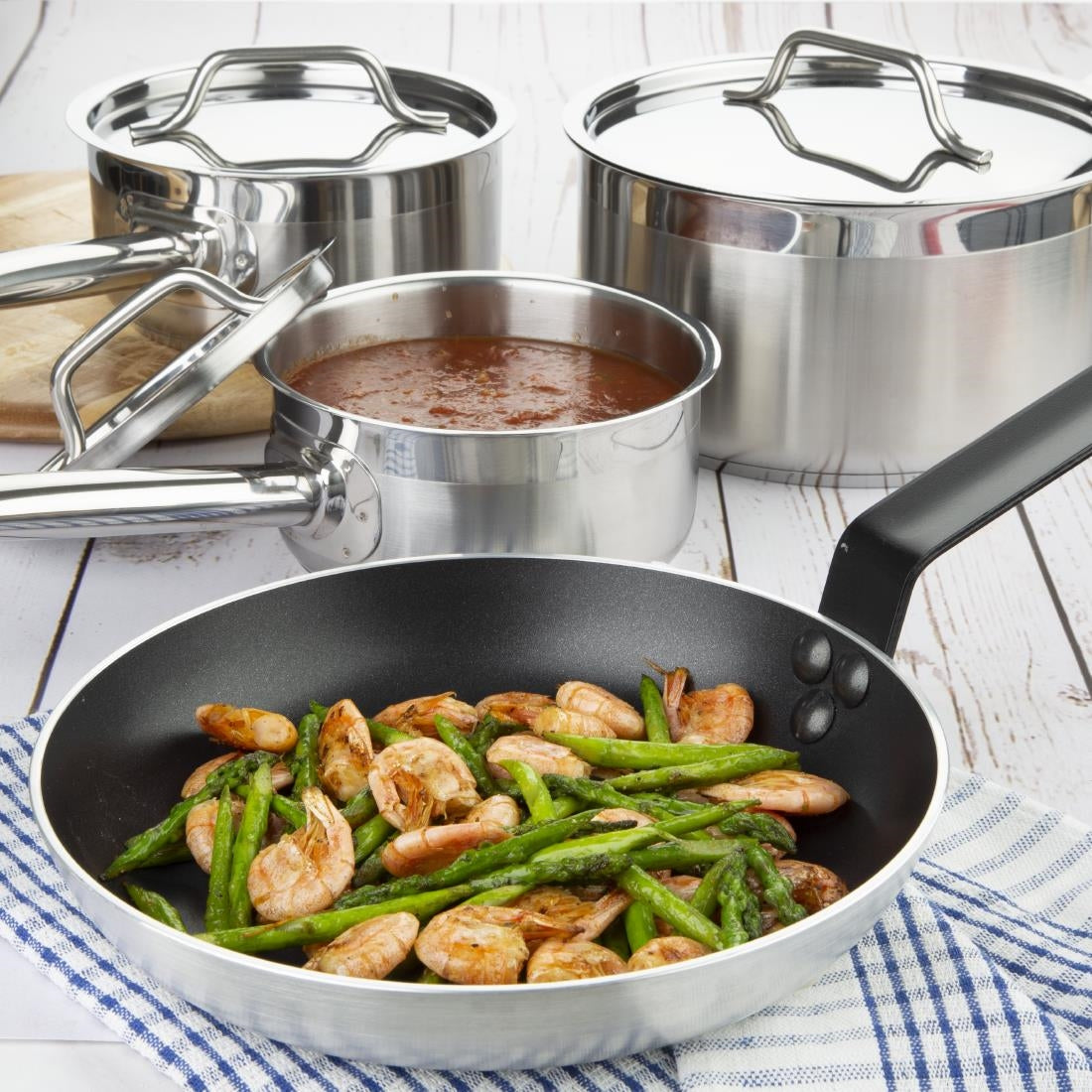 Nisbets Essentials Cook Like A Pro Stainless Steel & Aluminium 4-Piece Saucepan and Frying Pan Set - SA689